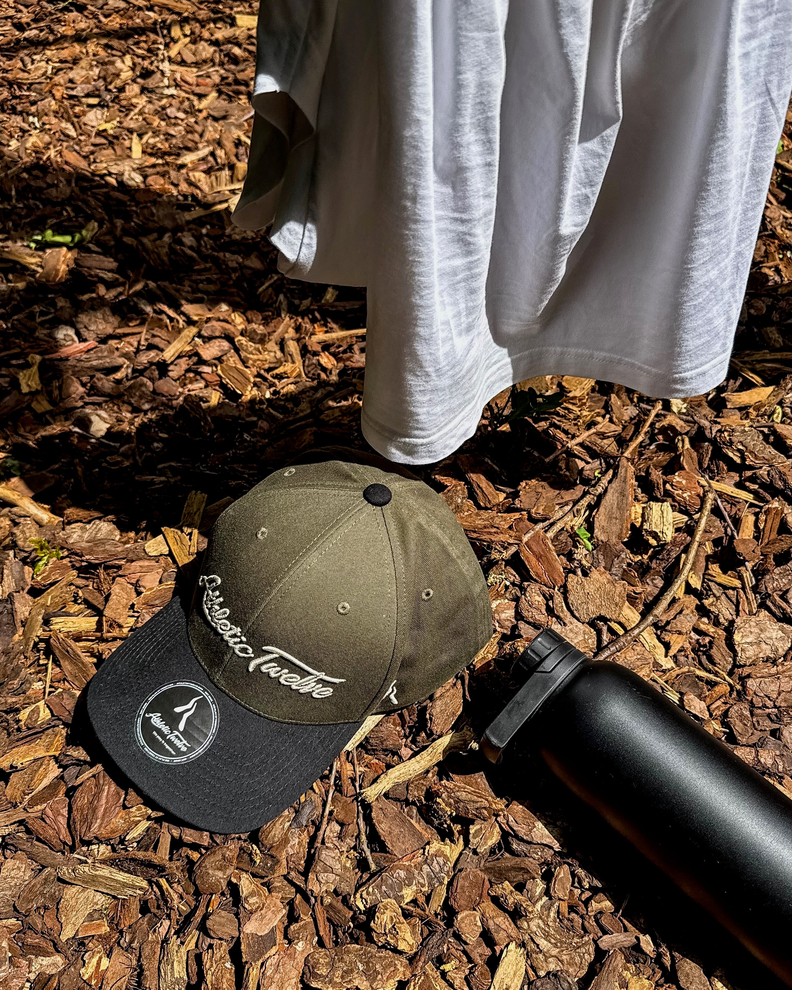 Athletic Twelve baseball cap · Green & Black