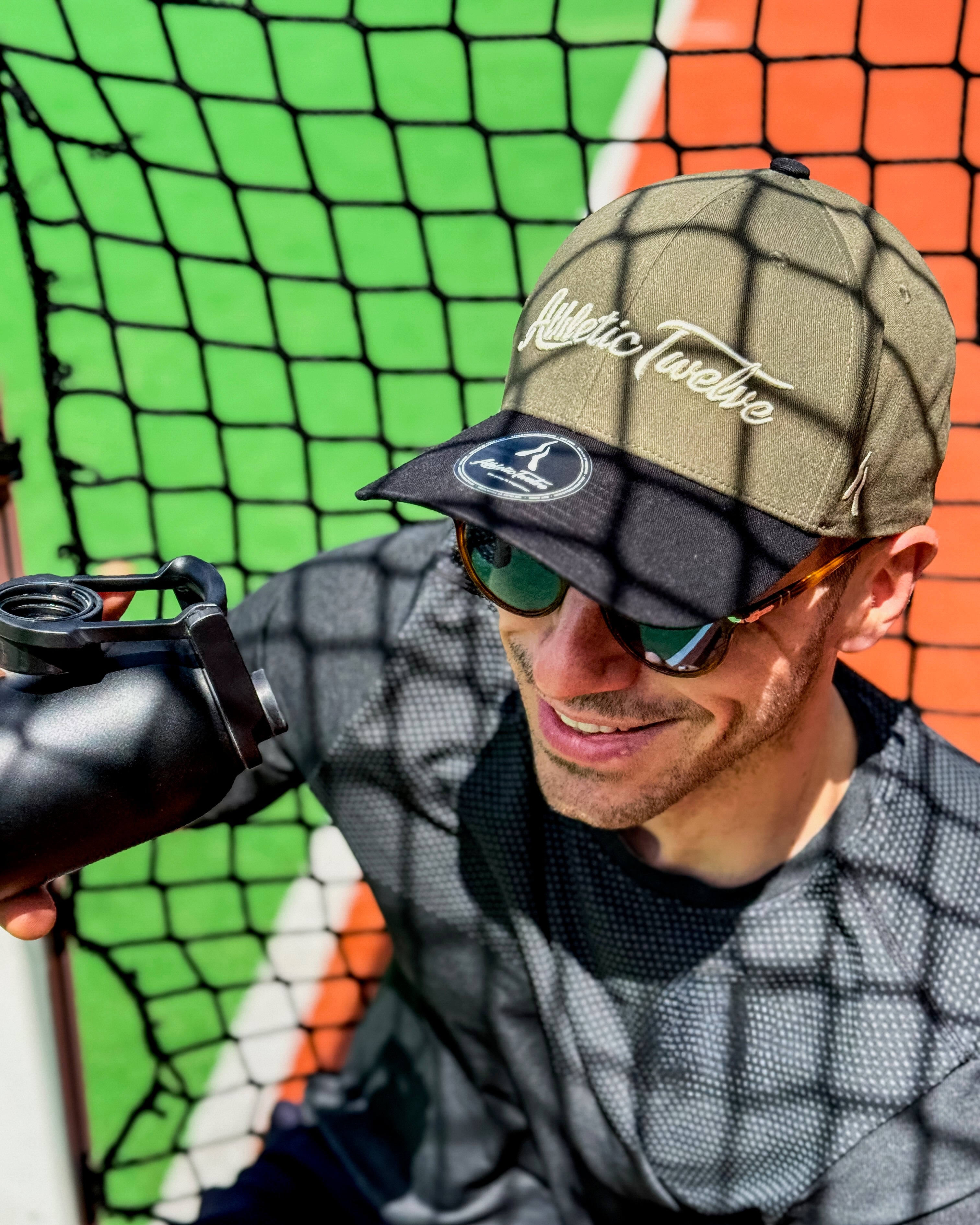 Athletic Twelve baseball cap · Green & Black